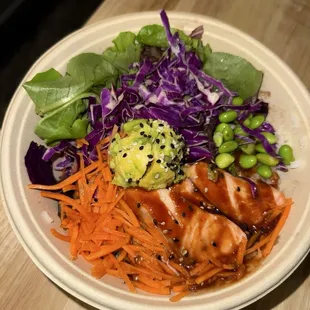 Salmon bowl with the creamy teriyaki sauce. Soooooo good. There's white rice under all the veggies.