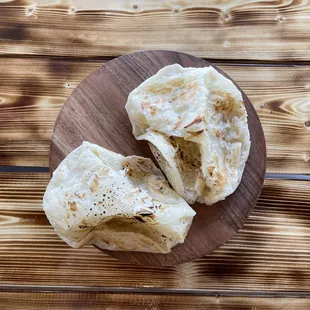 Roti bread can be dipped w/ condensed milk or peanut sauce