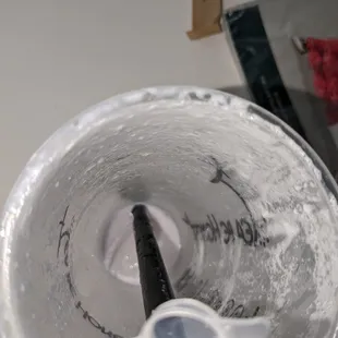 I emptied my drink in the sink to investigate, and behold, some big ass piece of plastic.