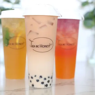 Front: Rose Milk Tea, Back left: Honey Kumquat Lemon Tea, Back Right: Mango Galaxy