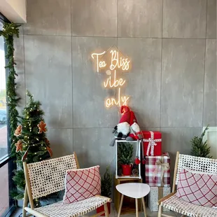two chairs and a christmas tree
