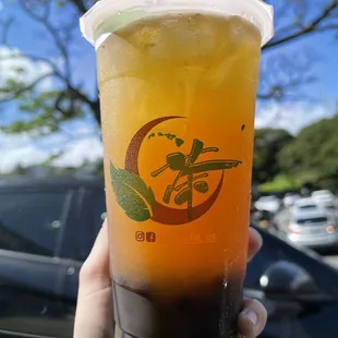 Peach green tea with boba