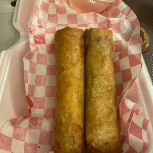 Egg rolls - lots of great flavors - including pork. 3 in order, 1 missing.