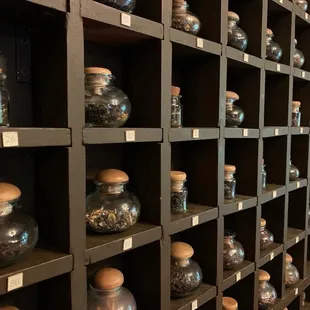 a wall of glass jars