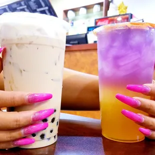 Her cups runneth over. I hope that doesn&apos;t mess up her nails.