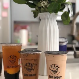 From left to right: Peach green tea with honey boba, Vietnamese coffee, and milk tea with boba