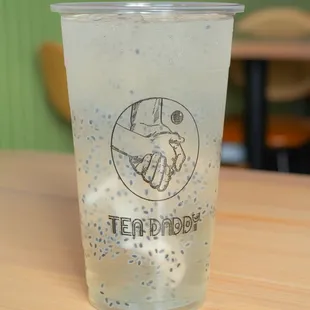 a cup of iced tea on a table