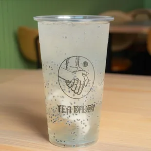 a cup of iced tea on a table