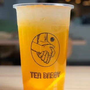 a plastic cup with a drink in it