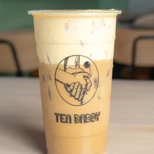 a cup of iced tea on a table