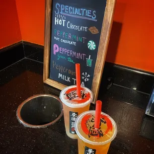 two drinks and a chalk board