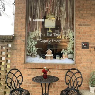 two chairs and a table outside