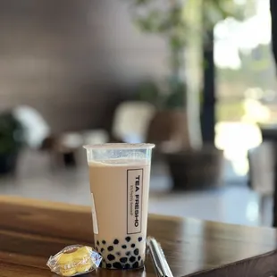 classic milk tea with passion fruit macaron