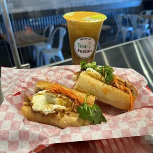 two sandwiches on a table