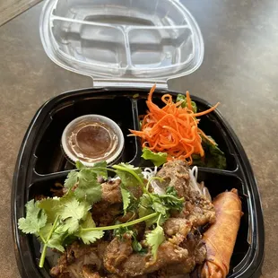 Vermicelli bowl with grill pork and our "signature" egg rolls