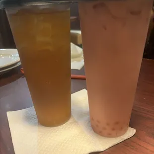 Strawberry milk boba tea and rose rose tea with boba, delicious drinks