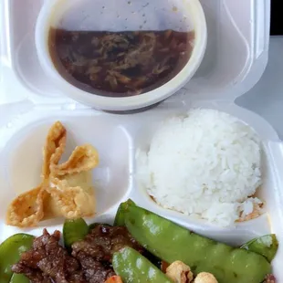 Beef snow peas with hot &amp; Sour soup on the lunch bag menu.
