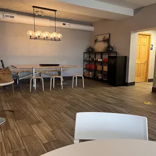 a table and chairs in a room