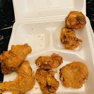 fried chicken in a styrofoam container