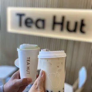Matcha latte and oolong milk tea with boba