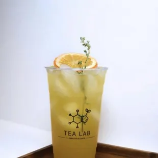 a glass of lemonade on a tray