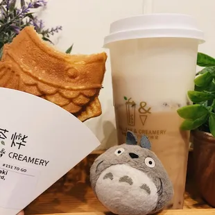 Custard taiyaki, fish-shaped pastry, and cheese foam milktea.