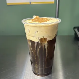 Pumpkin spice foam coffee