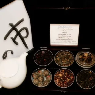 a variety of teas and teapots