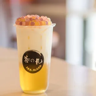 Tea Maru Latte with strawberry, mango and sweet potato boba
