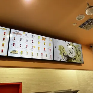 menus on the wall of a restaurant
