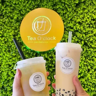 Rock sugar pear tea w/ aloe jelly and a classic jasmine green milk tea with boba bother with 75% sweetness