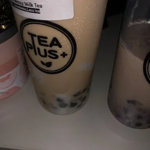 Taro messy milk tea on the left, ube messy milk on the right.