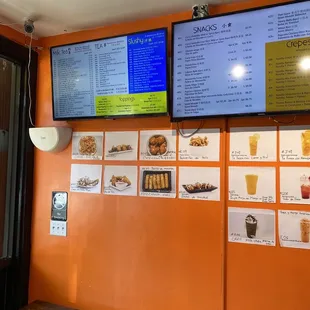 menus on the wall of a restaurant