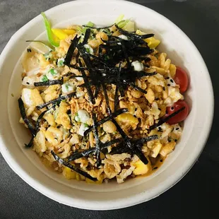 a bowl of rice and vegetables