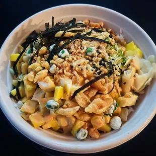 a bowl of noodles and vegetables