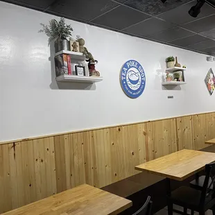 a row of tables and chairs