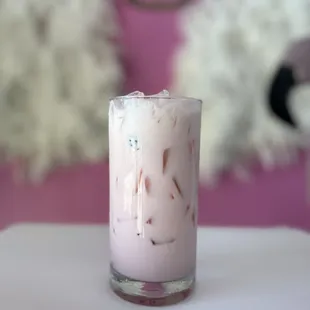 a close up of a glass of iced coffee