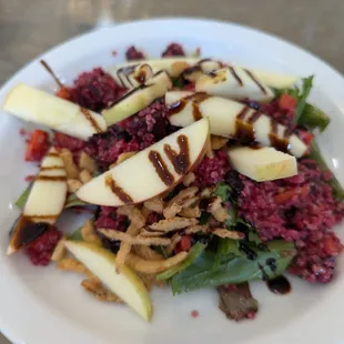 quinoa salad - pink from the beets. apples! balsamic! high quality lettuce. the crispy fried onions made this god-tier.