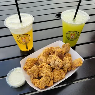 Kumquat green tea, sugar cane juice, and popcorn chicken.