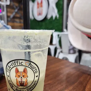 a plastic cup with a drink in it
