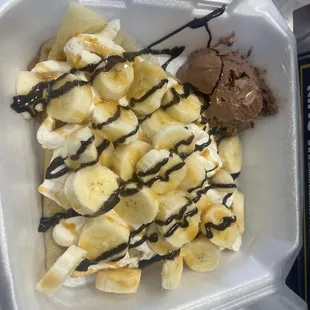 a banana and chocolate ice cream sundae