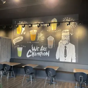 a restaurant with a chalkboard wall