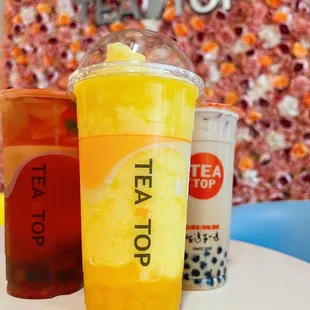Mango slushy, pearl milk tea, strawberry green tea