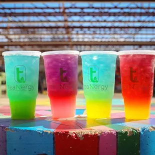 four different colored drinks
