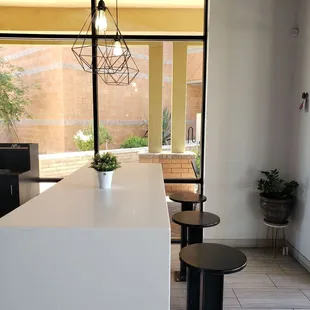 a view of a kitchen and dining area