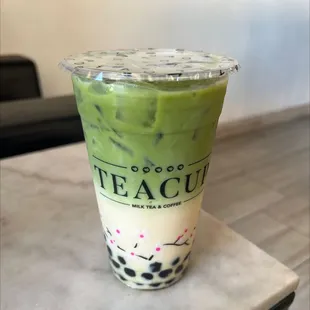 Brown sugar matcha latte with boba