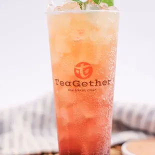 a glass of iced tea with mint