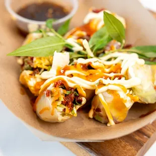 a plate of food on a cutting board