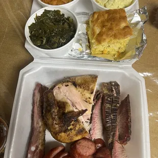 My 4 Meats BBQ Plate, plus Jalapeño cornbread and a side of potato salad and greens and yams