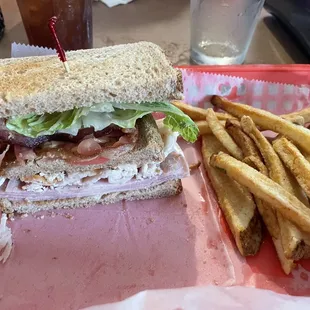 Club sandwich and fries